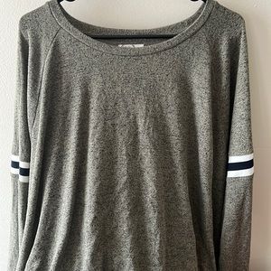 Maurice’s green long sleeve with blue and white stripe on arm